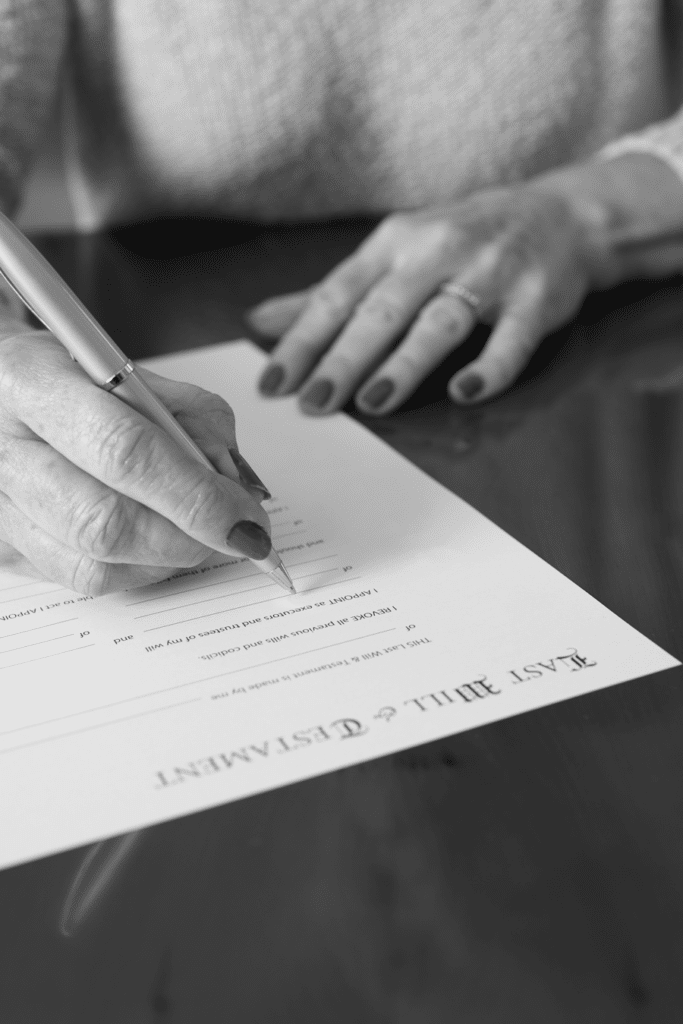 woman signing her will